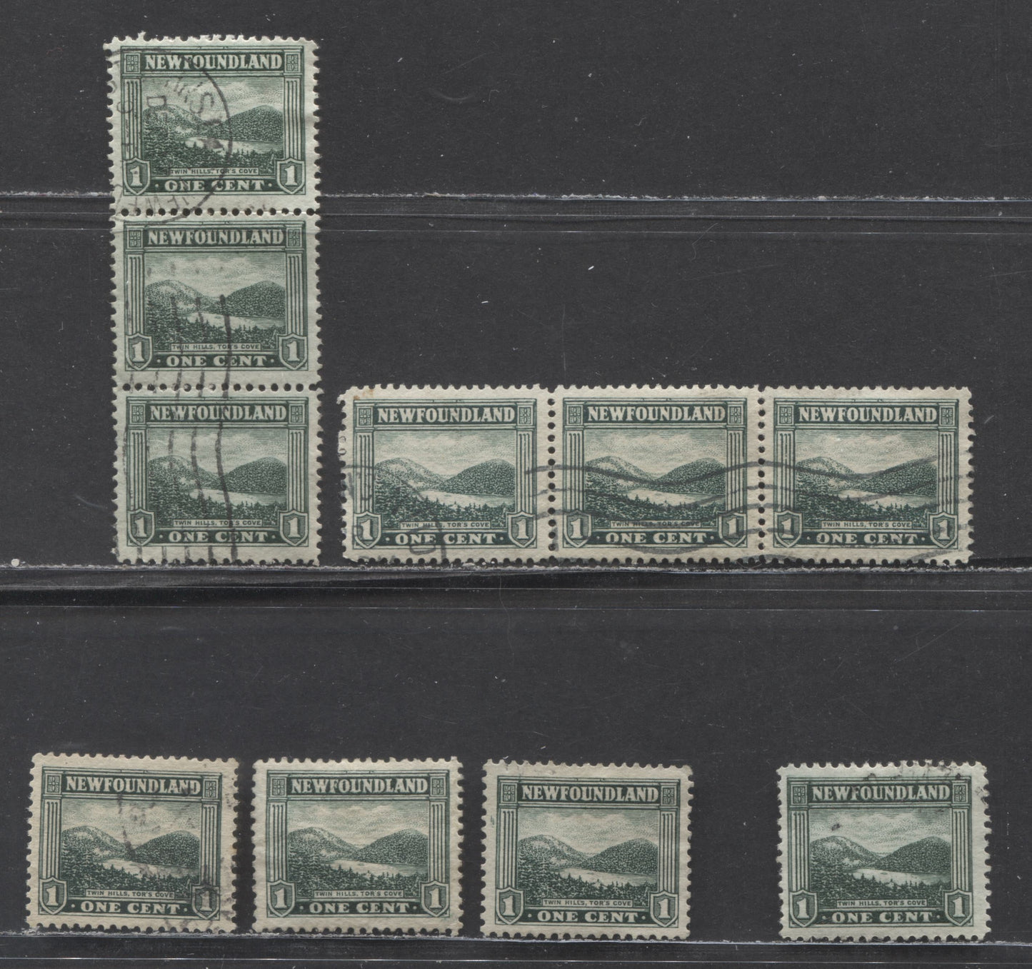 Newfoundland #131 1c Deep Bluish Green Twin Hills, 1923-1924 Pictoral Issue, 4 Very Fine Used Singles And 2 Strips Of 3 All With Unlisted Re-Entries, Mostly Occuring Near Or Above Upper Frameline. Also Includes Misplaced Entry
