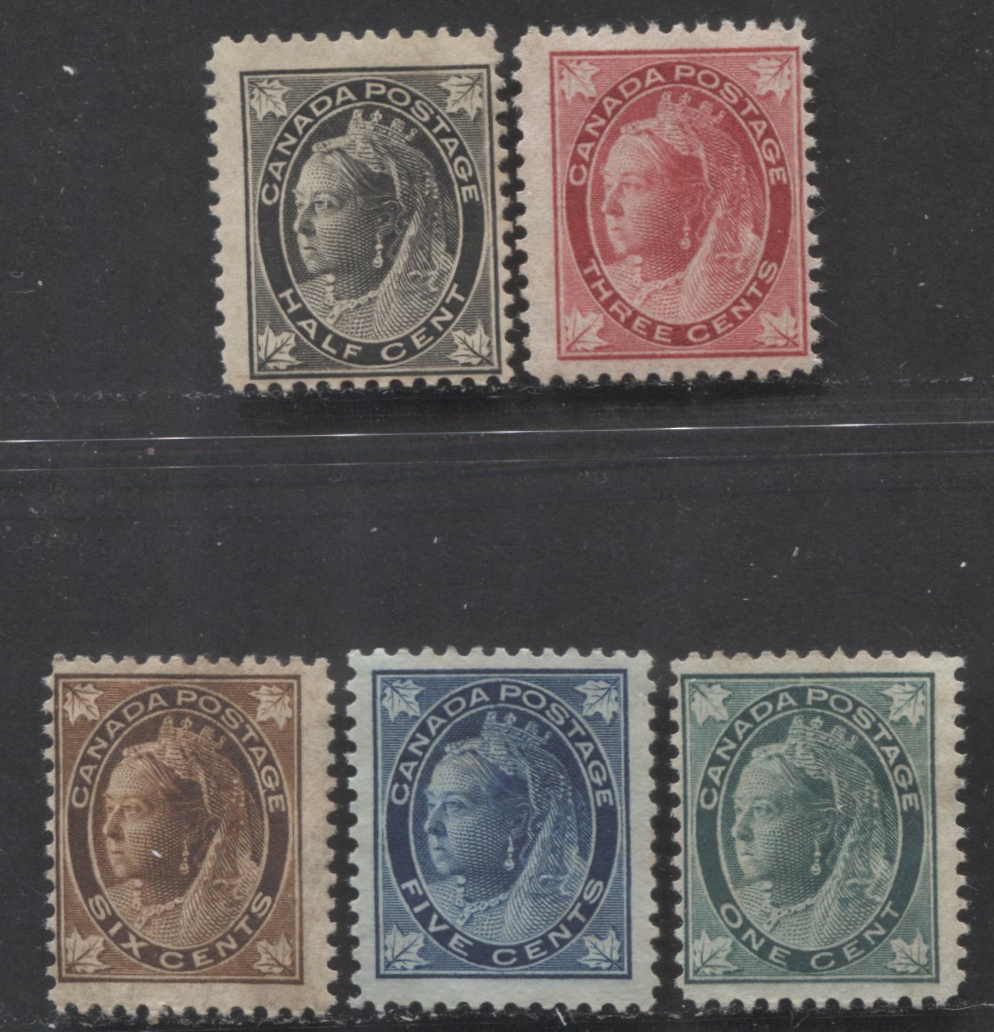 Lot 113 Canada #66-67, 69-71 1/2c - 6c Black - Brown Queen Victoria, 1897-1898 Maple Leaf Issue, 5 Very Good/Fine Unused Singles With Some Mildew Discoloration, Should Come Out With A Good Soak