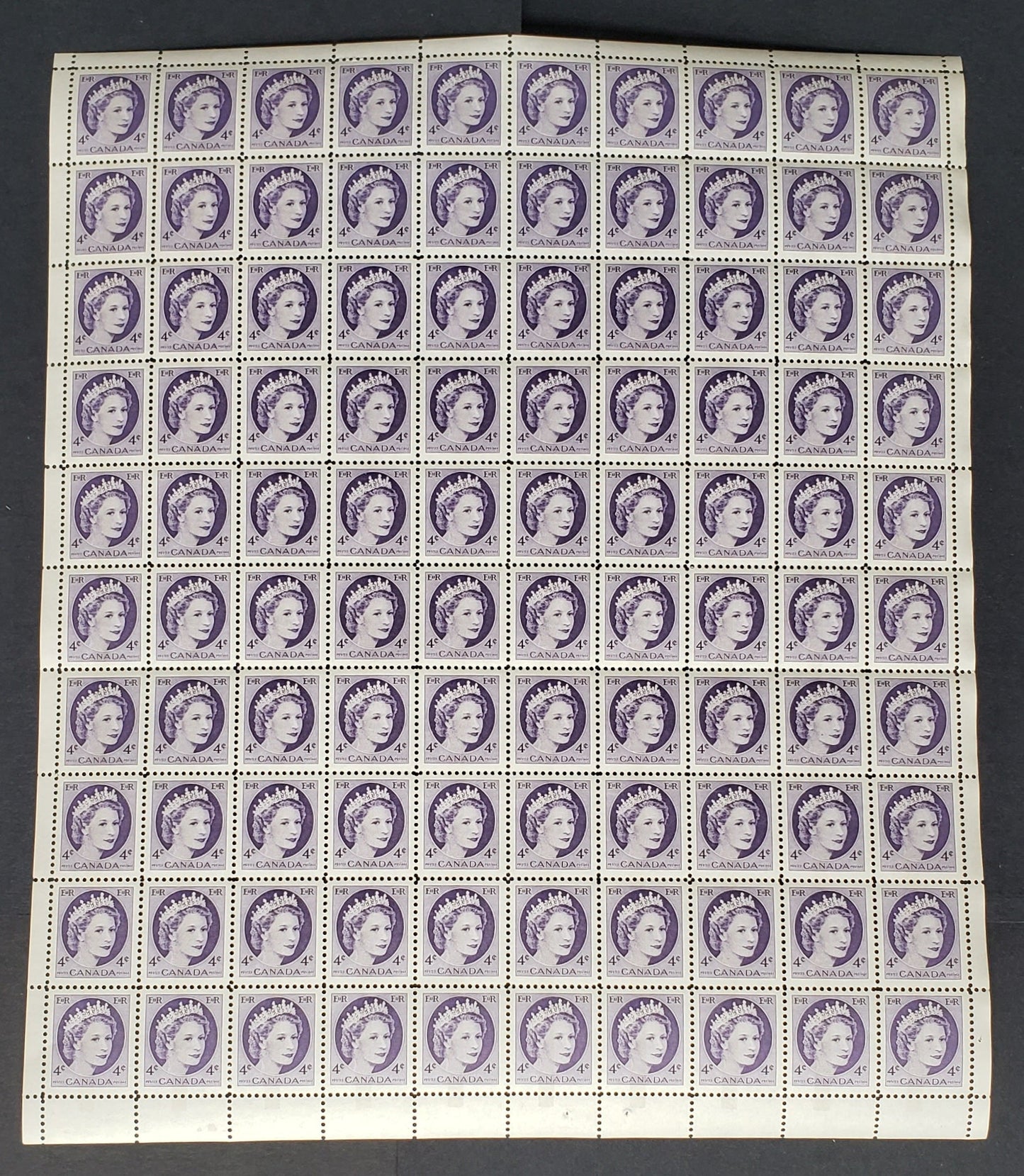 Lot 221 Canada #340p 4c Violet, 1954 Queen Elizabeth 2 - Wilding Portrait Issue, A VFNH Winnipeg Tagged Full Unfolded Lower Center Pane Of 100 On DF Smooth Paper. Extremely Well Centered For This.