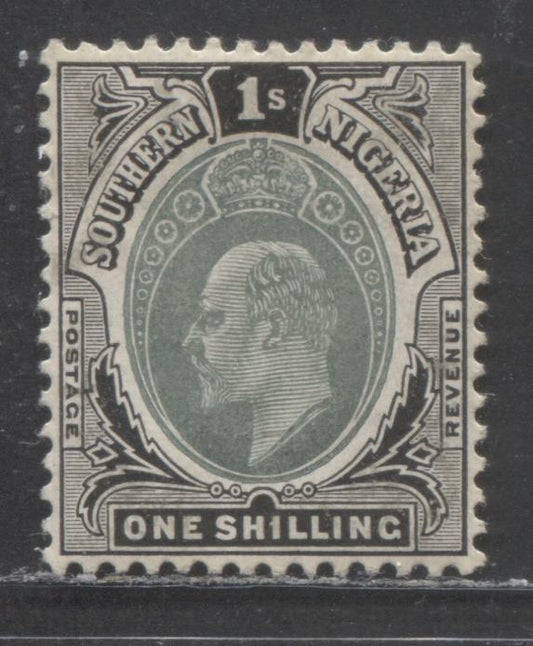 Lot 86 Southern Nigeria SC#27a 1/- Black/Dull Bluish Green On Chalky Paper 1904-1909 King Edward VII Issue, Multiple Crown CA Wmk, A VFOG Single, Click on Listing to See ALL Pictures, 2022 Scott Classic Cat. $45 USD