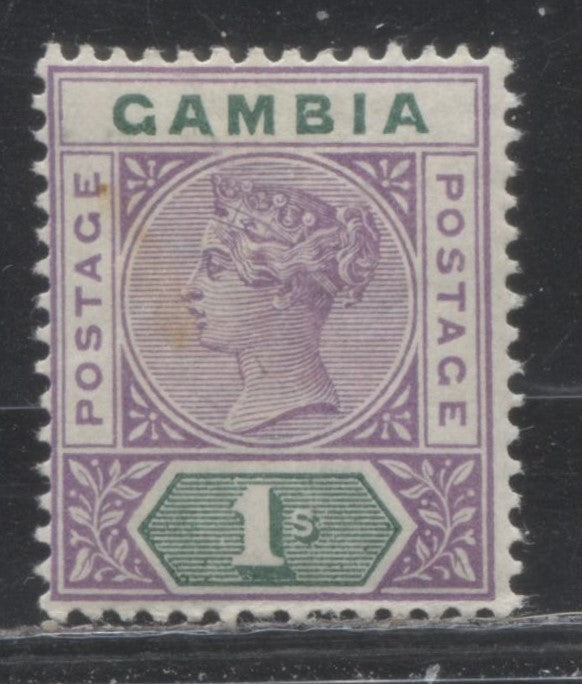 Lot 167 Gambia #27 (SG#44) 1/- Violet and Green Queen Victoria, 1898-1902 Keyplate Issue, a Fine Mint OG Example, 2022 Scott Classic Cat. $45 USD