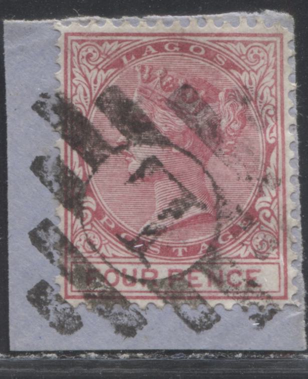 Lot 237 Lagos SG#14 (SC#10) 4d Deep Carmine Rose, Queen Victoria, 1876-1880 Line Perf. 14 Crown CC Watermarked Issue, 1st Printing, A Very Fine Used Example on Small Piece With Complete Strike of Lagos Grid Killer