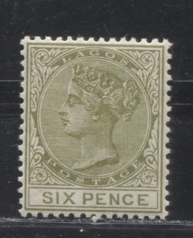 Lot 271 Lagos SG#25 (SC#26) 6d Brownish Yellow Olive, Queen Victoria, 1884-1886 Second Crown CA Watermarked Issue, 6th Printing, A Very Fine Mint LH Example, 2022 Scott Classic Cat. $9 USD