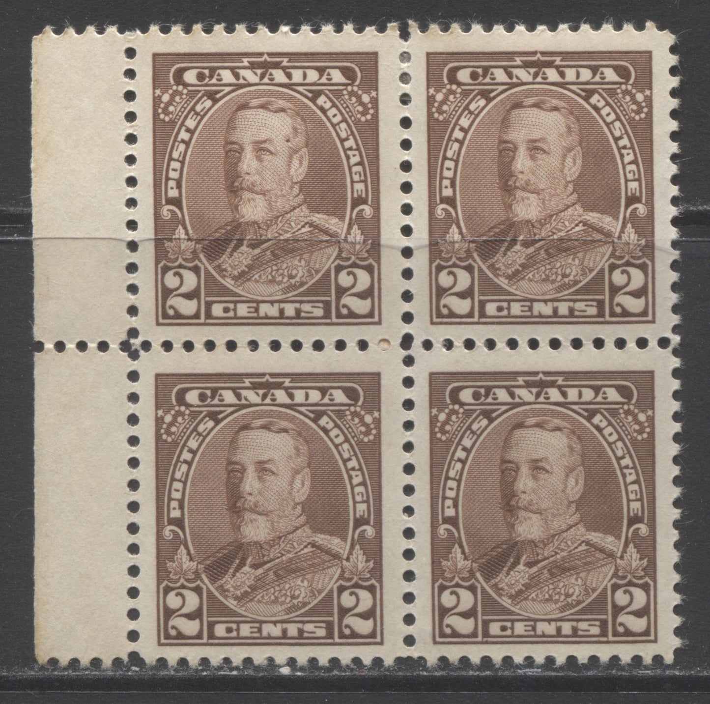 Lot 146 Canada #218i 2c Brown King George V, 1935 Pictorial Issue, A VFOG Plate 2 Left Block Of 4 Showing Mole On Forehead On UL Stamp With 3 Regular, Pos 21, Cream Gum, Vertical Wove With Mesh