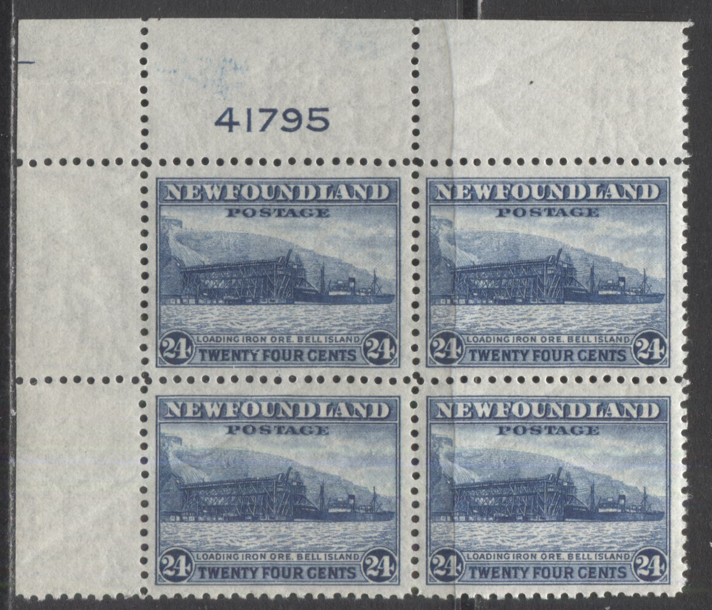 Lot 237 Newfoundland #264 24c Deep Blue Loading Ore, 1941-1944 Resources Re-Issue, A VFNH UL Plate 41795 Block Of 4