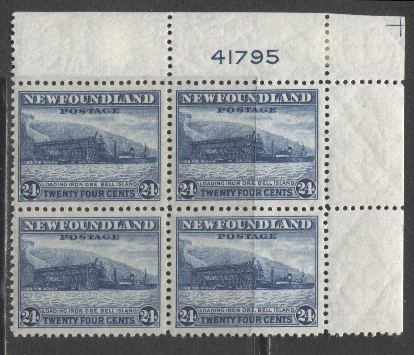 Lot 238 Newfoundland #264 24c Deep Blue Loading Ore, 1941-1944 Resources Re-Issue, A VFNH UR Plate 41795 Block Of 4