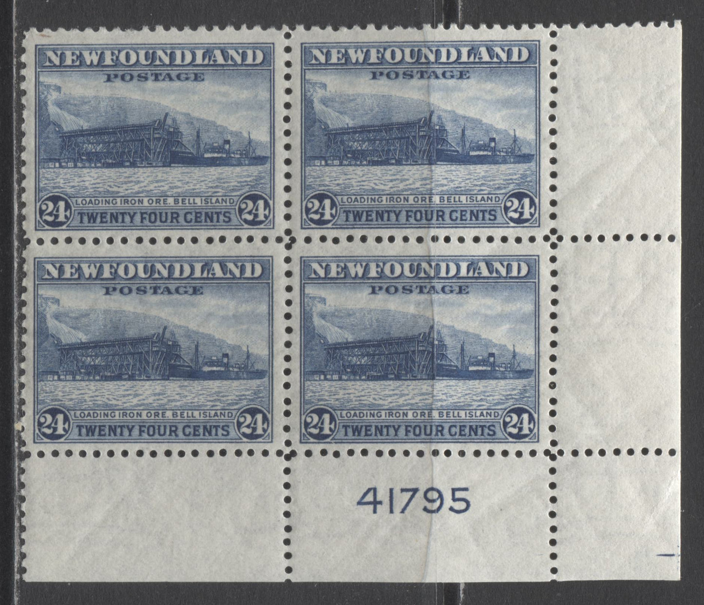 Lot 239 Newfoundland #264 24c Deep Blue Loading Ore, 1941-1944 Resources Re-Issue, A FNH LR Plate 41795 Block Of 4