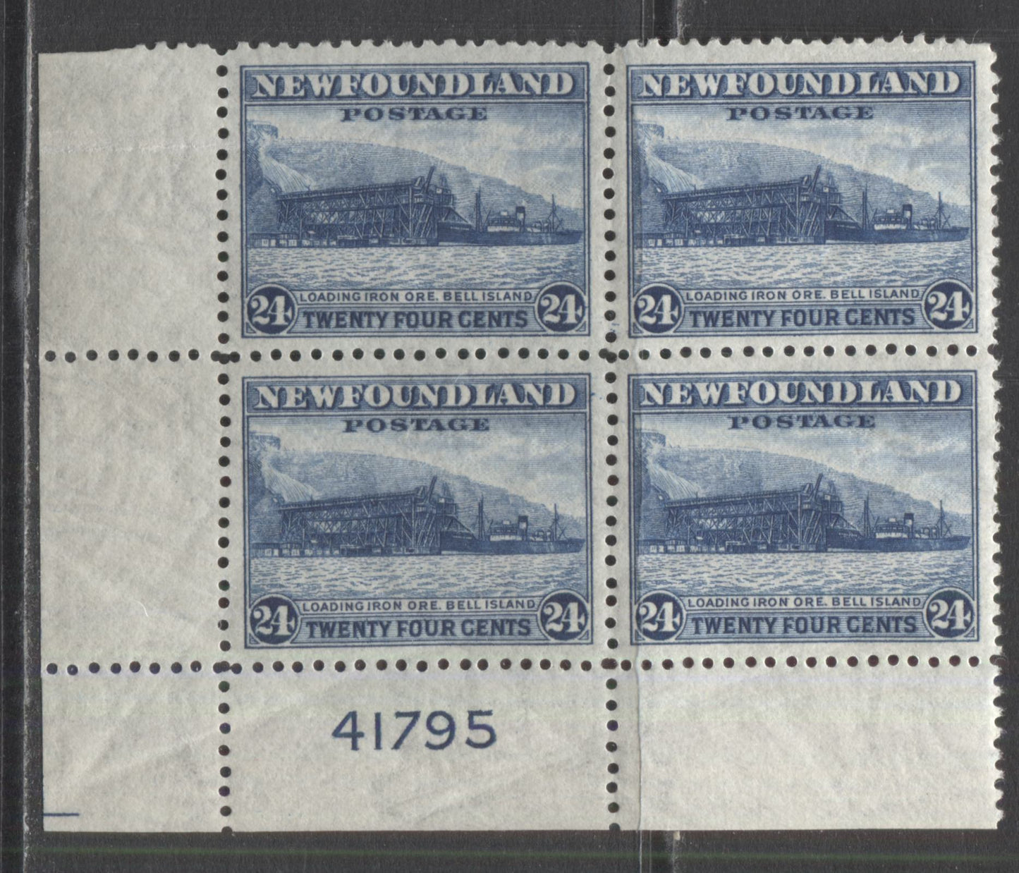 Lot 240 Newfoundland #264 24c Deep Blue Loading Ore, 1941-1944 Resources Re-Issue, A VFNH LL Plate 41795 Block Of 4