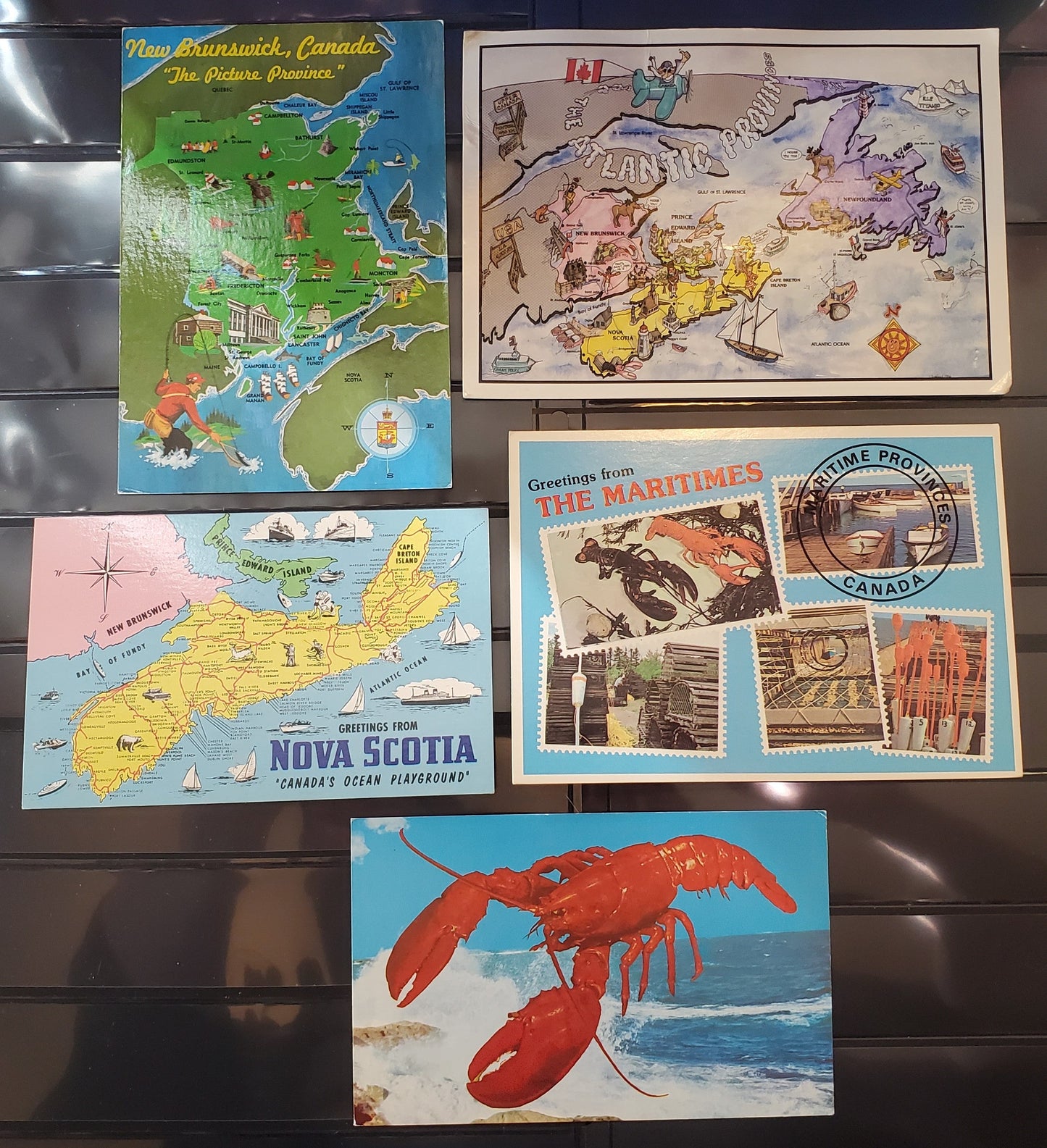 A Group of 4 Postcards From The Maritimes, Showing Maps and Tourism Themes, From The 1970's-1990's, Overall Fine and VF, Net Est. $2