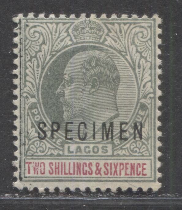 Lot 330 Lagos SG#51 (SC#47) 2/6d Dull Green and Carmine, King Edward VII, 1903-1904 Crown CA Watermarked Issue, a Fine OG Example with Specimen Overprint, Net Est $22 USD,  Click on Listing to See ALL Pictures