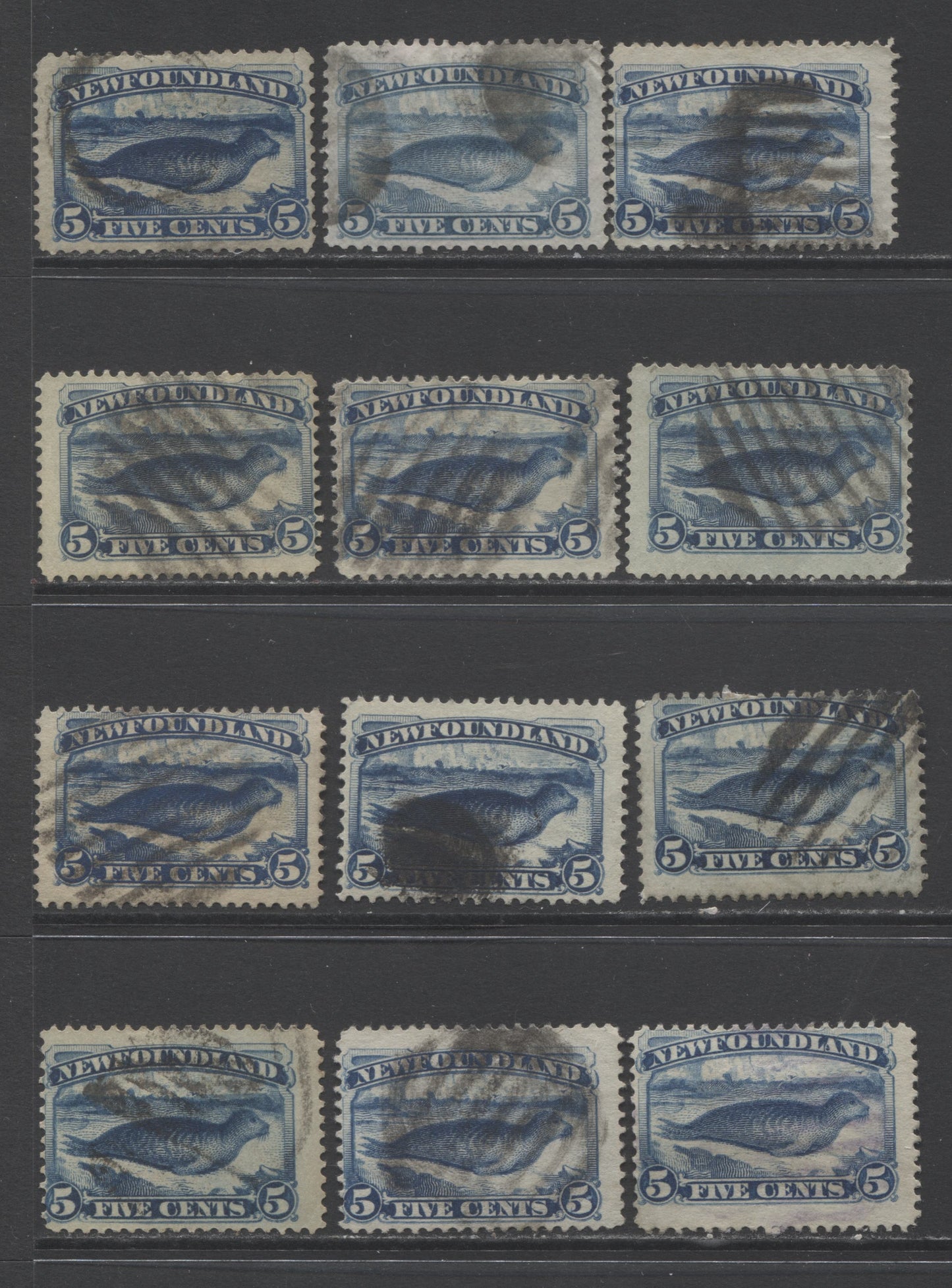 Lot 335 Newfoundland #53-54 5c Pale Blue & Dark Blue Hard Seals, 1880-1896 Third Cents Issue, 13 Very Good - Fine Used Singles, A Study Group Showing Different Papers & Shade Variations