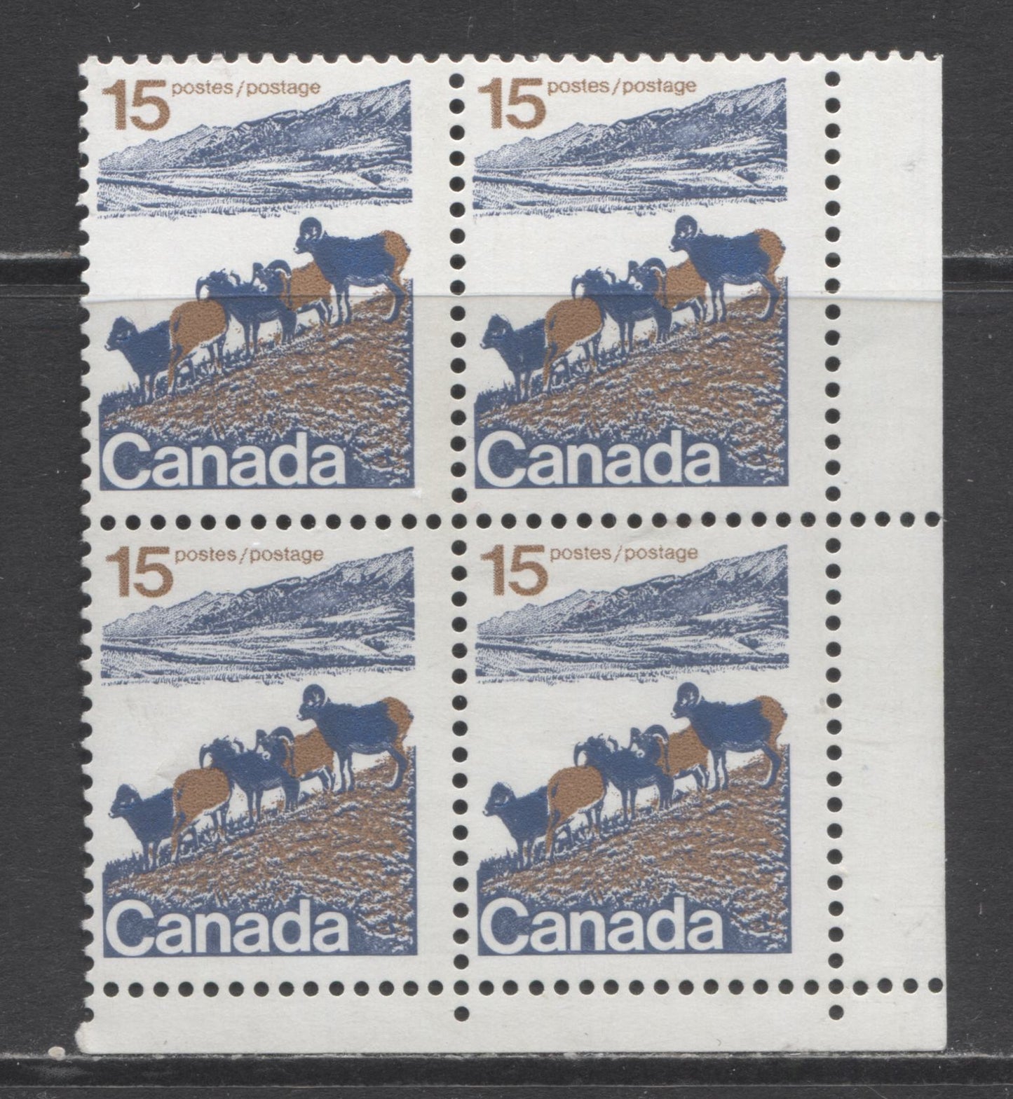 Lot 397 Canada #595i 15c Multicoloured Mountain Sheep, 1972-1978 Caricature and Landscape Issue, A Fine NH/OG LR Corner Block of 4On LF/LF Paper, 1 Bar Tagging Error