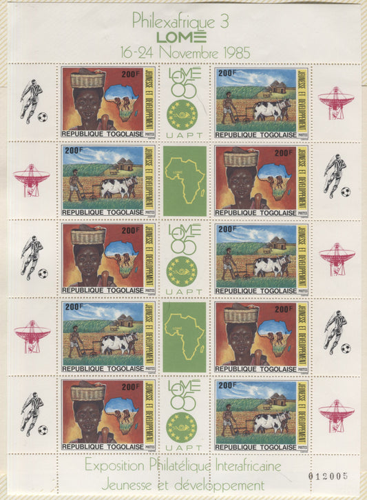 Lot 85 Togo SC#1316-1317a 1985 Lone Philexafrica Issue, A VFNH Sheet Of 5 Gutter Pairs, Click on Listing to See ALL Pictures, 2017 Scott Cat. $20 USD