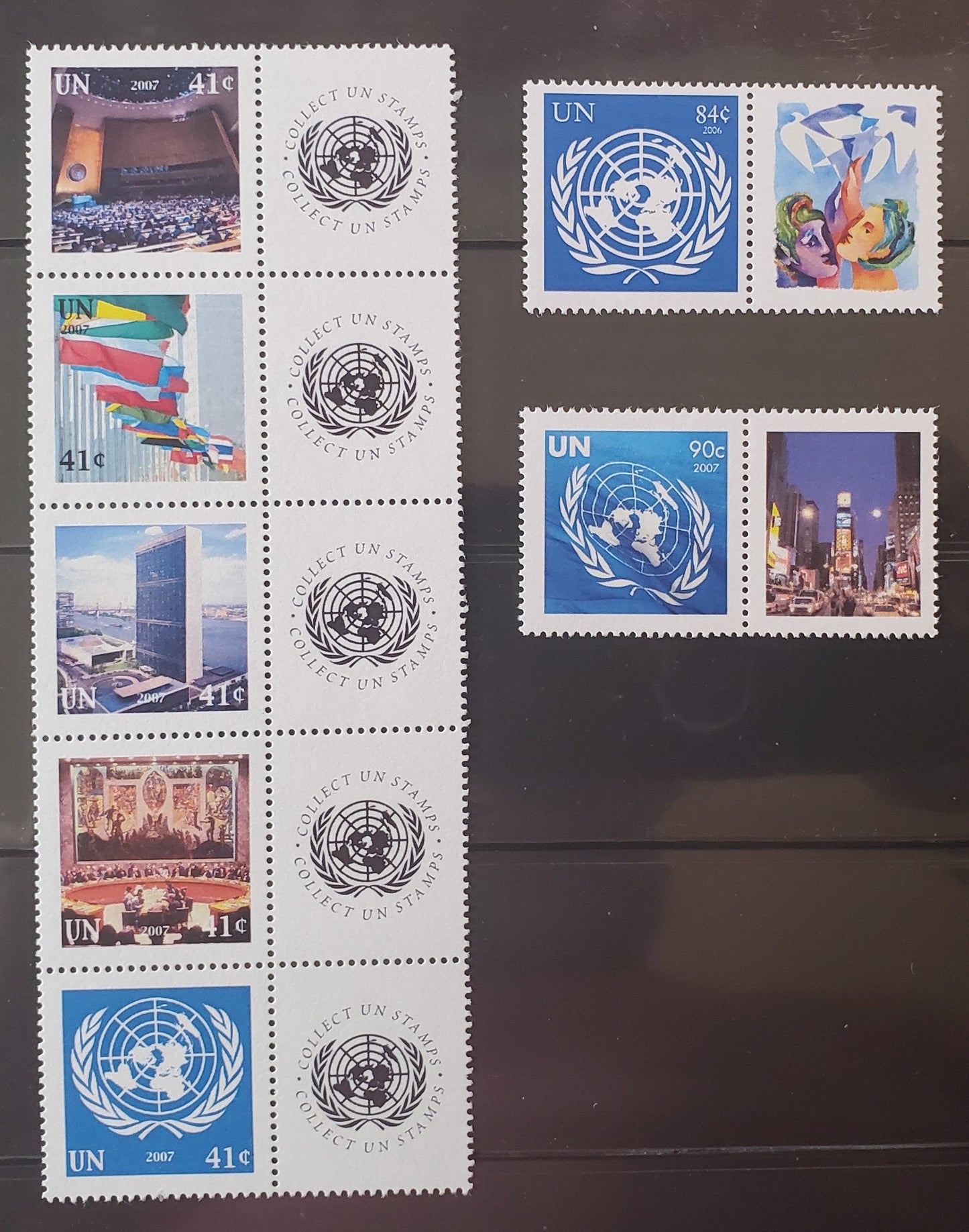 Lot 97 United Nations SC#931/939 2007 UN Symbols, On HF/HF Paper, 3 VFNH Pairs & Strip Of 5 With Labels, Click on Listing to See ALL Pictures, 2017 Scott Cat.  $29.5 USD