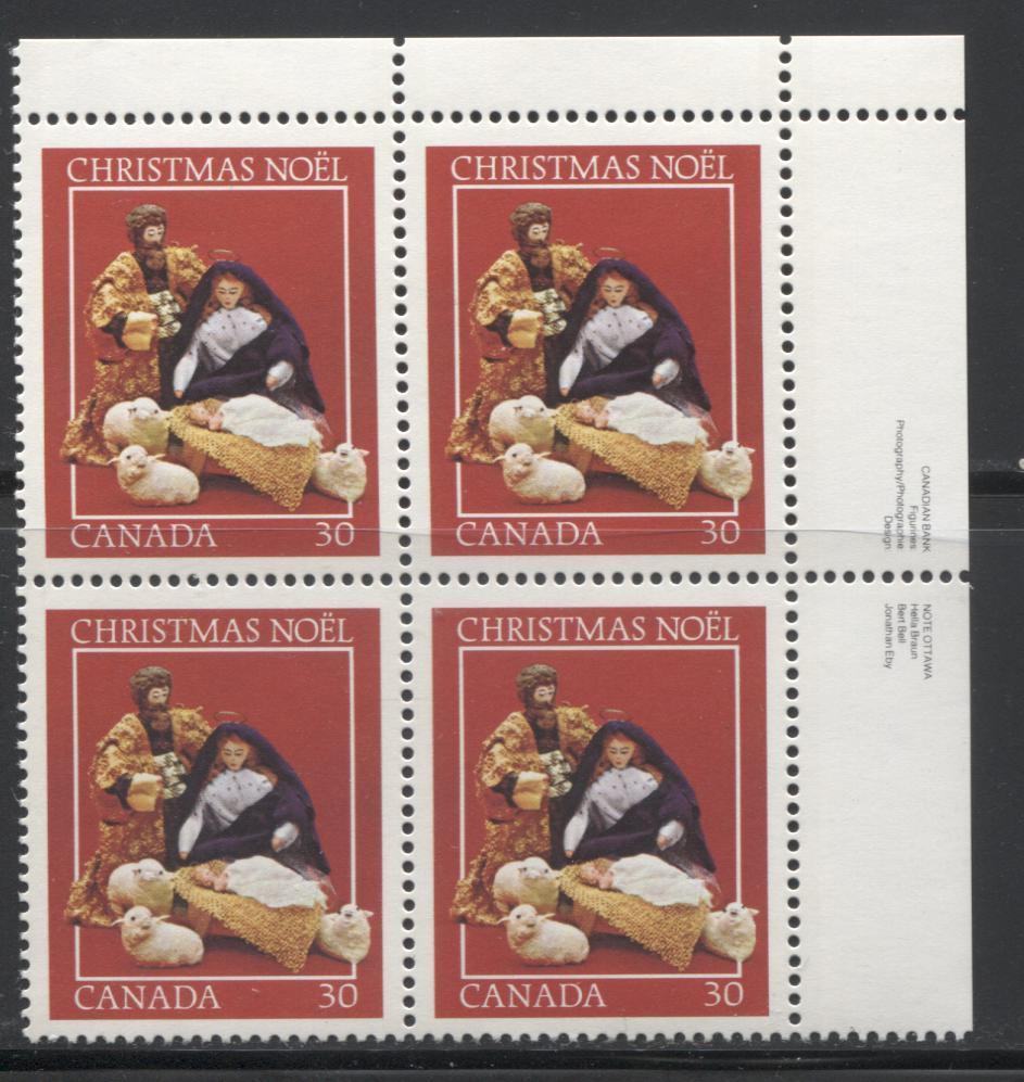 Lot 205 Canada #870/973 1980-1982 Christmas Issues - A Group of 8 Upper Right Inscription Blocks on DF/NF or DF Paper